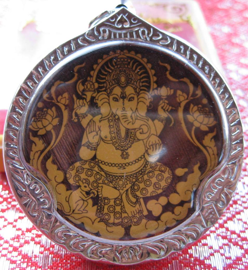Wood Carved Amulet with stainless steel case FRONT VIEW