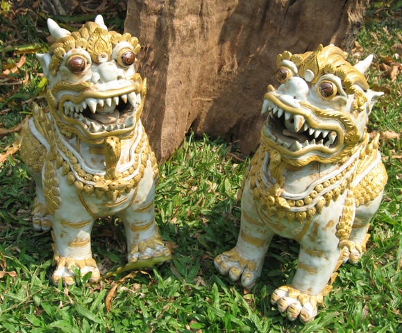 Pair of Celadon Ceramic Foo Dogs