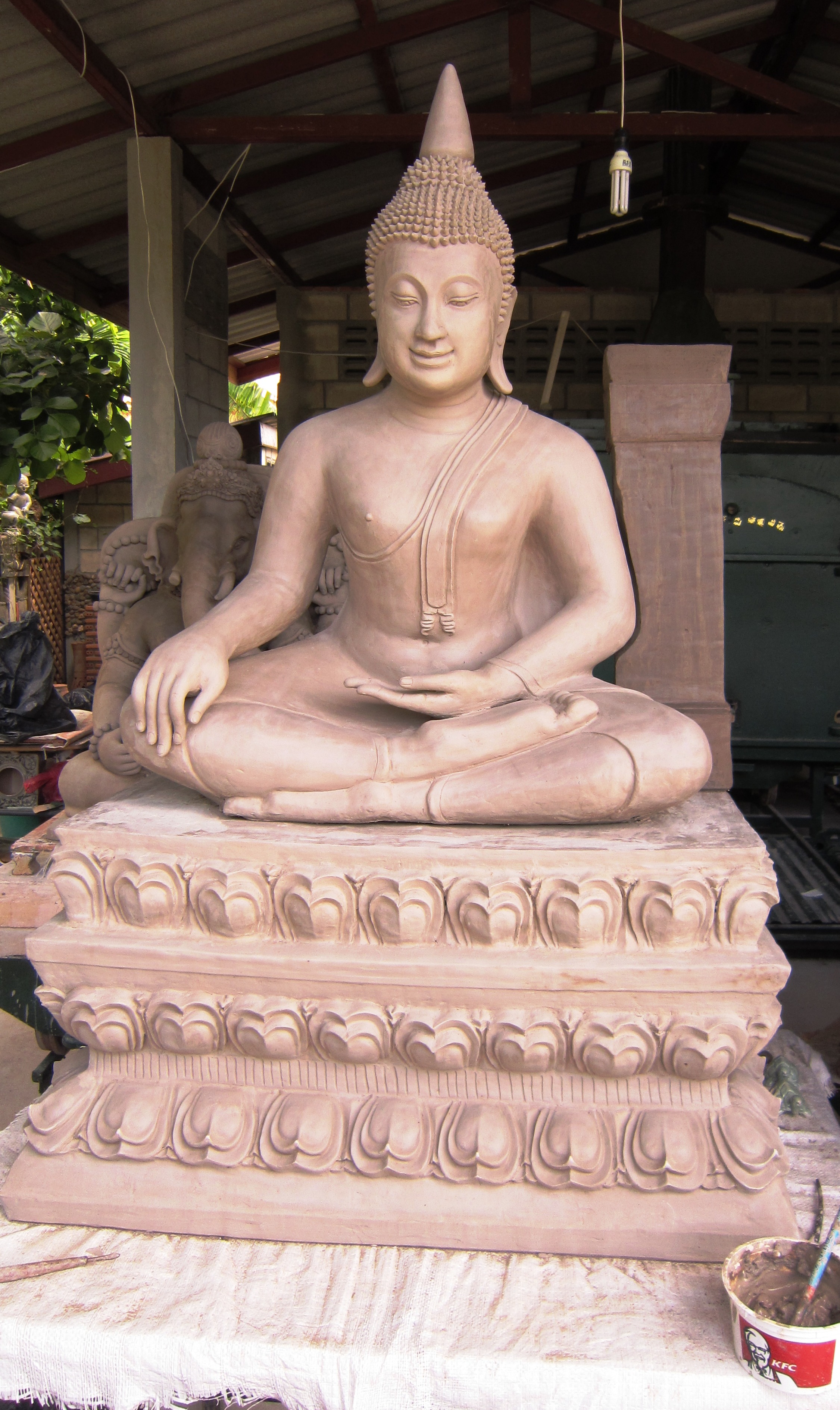 hand sculpted celadon Buddha